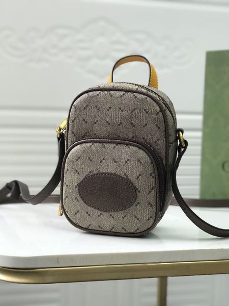 

the ouverture collection woman neo vintage mini bag in beige/ebnoy decorated by an oval leather tag that brings together with a feline detai