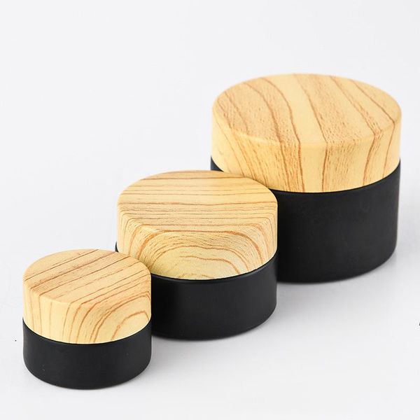 Barattoli in vetro smerigliato nero vasetti cosmetici con coperchi in plastica woodgrain fodera PP 5G 10G 15G 20G 30G 50G Bottiglie di imballaggio labbra RRE8645