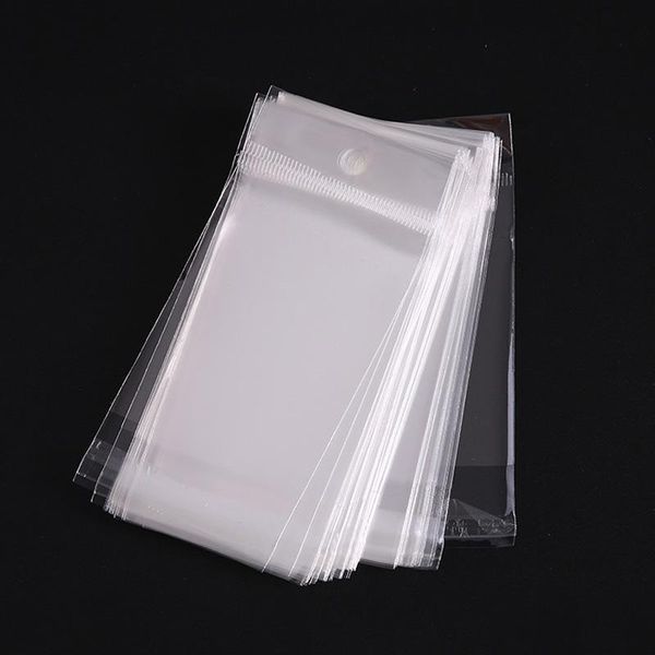 

100pcs clear self adhesive seal plastic bags transparent resealable opp packing poly hanging holes 6 sizes gift wrap