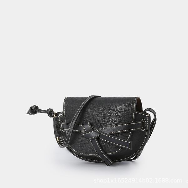 

leather one shoulder crossbody bow saddle lychee mini size bullet decorative women's bag