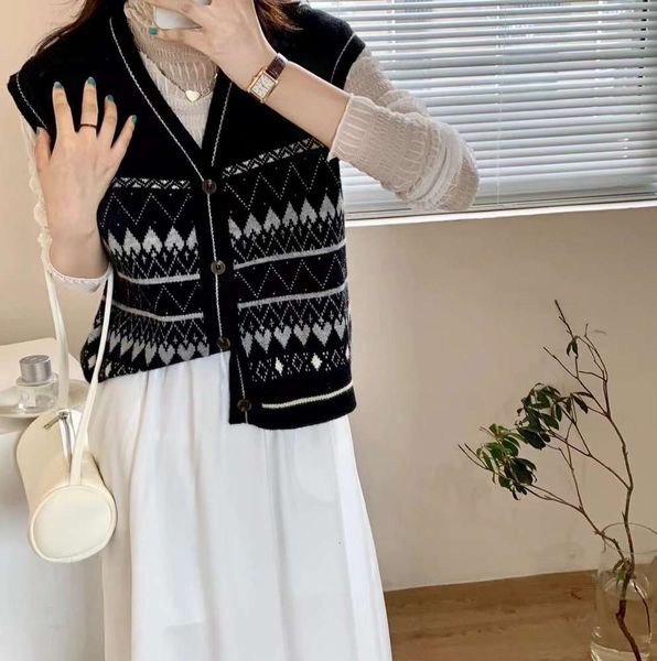 

loose v-neck knitted vest single breasted cardigan style women's vest, White