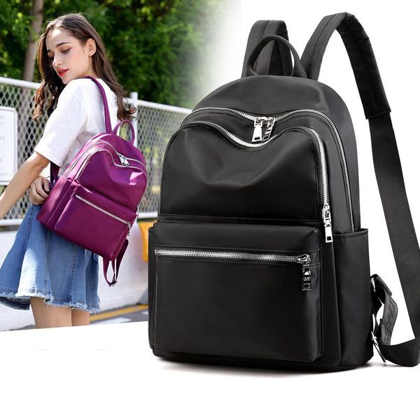 

outdoor bags 2021 ladies large capacity backpack waterproof simple fashion solid color oxford cloth canvas schoolbag nylon bag