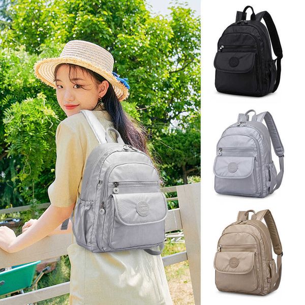 

winter new super high fashion backpack nylon waterproof simple lightweight computer bag one button