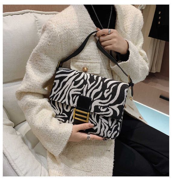 

texture 2021 autumn fashion personalized thousand bird lattice single shoulder bag women's korean oblique cross simple