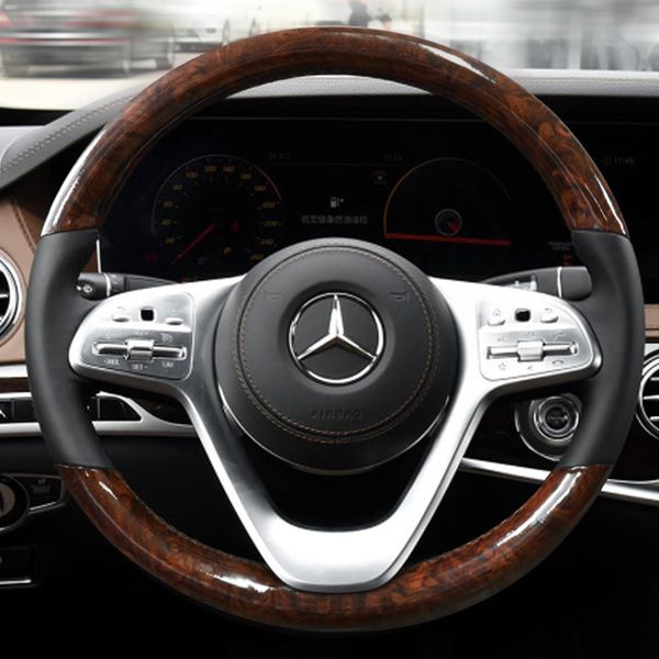 

it is applicable to the new mercedes benz s320, s350 and s400l imitation peach wood grain hand sewn steering wheel cover