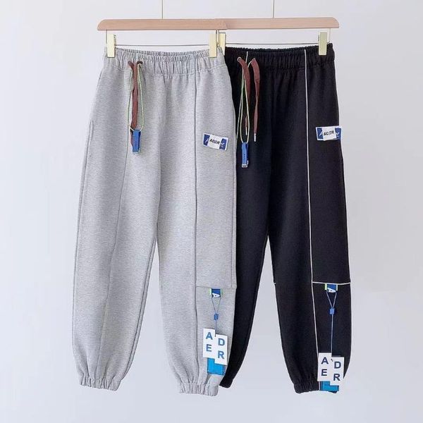 

men's pants 2021 ader error tore men women lacerated logo adererror sweatpants multiple pockets ribbon sign trousers, Black