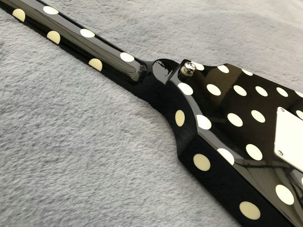 

electric guitar front and back wave dot black swallow tail shaped mahogany
