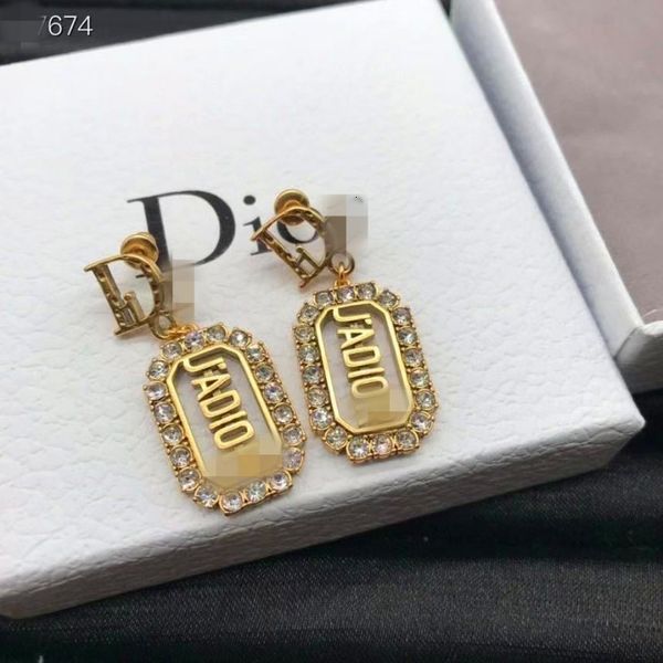 

70%off d family high version trend ja letter earrings, Golden