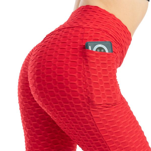 Pantaloni da yoga a bolle tascabili di moda europea e americana, glutei elastici alti da donna che sollevano leggings sottili per l'assorbimento del sudore da donna