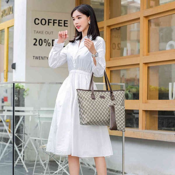 

handbag big women's leather foreign style child mother big simple large capacity tote hand single factory wholesale 70% off