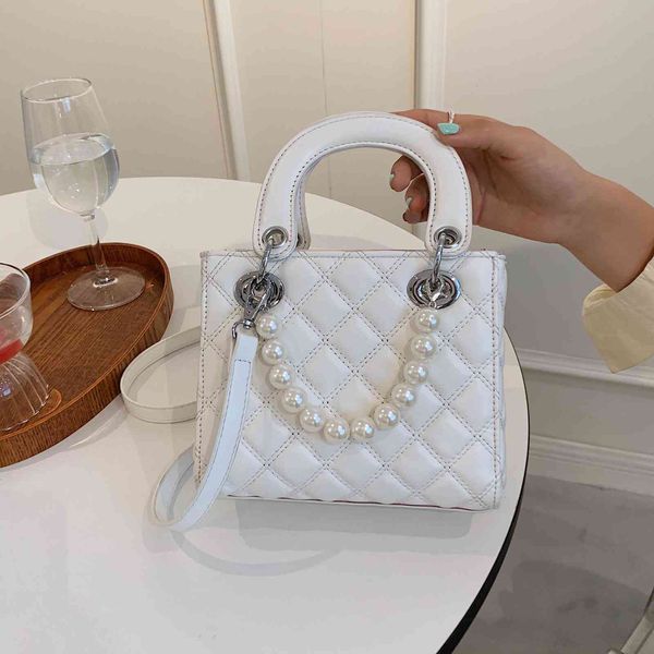 

2021 summer trend new korean fashion versatile princess of wales bag ling lattice embroidered thread single shoulder oblique span pearl bag