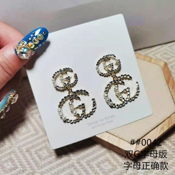 

design jewelry 925 silver needle letter earrings 2021 new pearl zircon palace style simple earrings for women