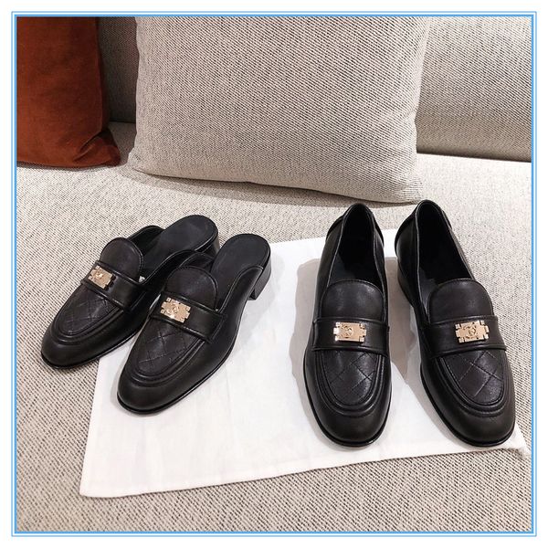 

selling high-end women shoes fashion trend metal chain decoration wide flat delicate shoes black true leather lady dress slippers office dre