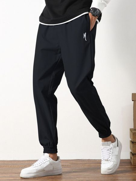 

men embroidery detail carrot pants m9km#, Black