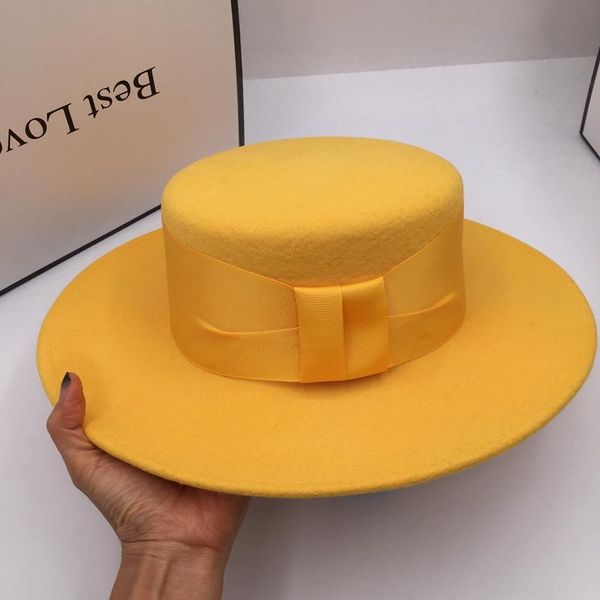 

in winter yellow wool flat hat with wide brim the fedoras caps & hats