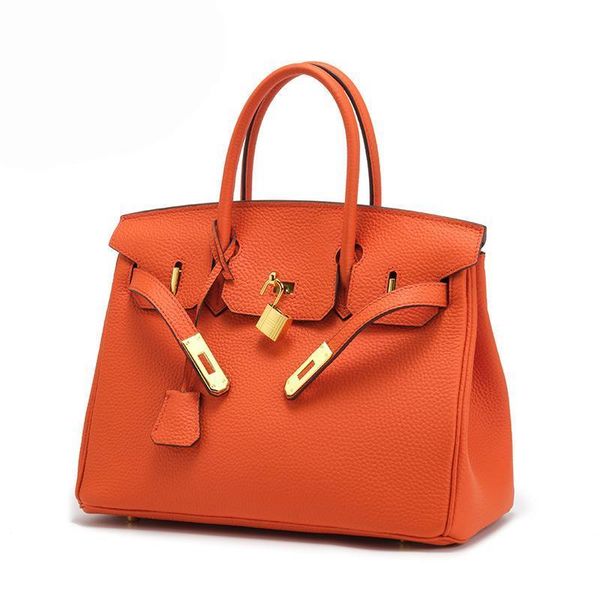 

2021 new leather for women large capacity hand temperament litchi pattern bag
