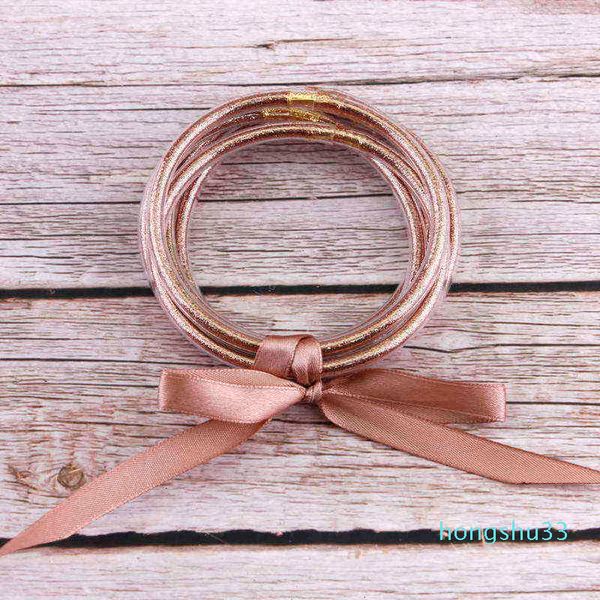 Bowknot Gold Glitter Bangles definir toda a pilha de tempo de silicone plástico geléia por atacado