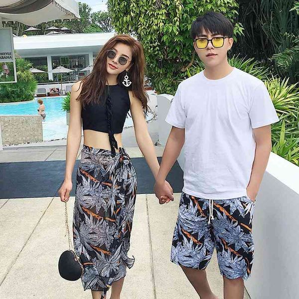 

south korean couple swimsuit summer new split men's swimming trunks women's three piece beach resort suit, White;black