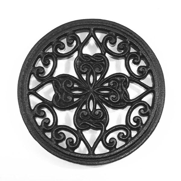 

mats & pads ad55 cast iron teapot trivet with rubber pegs for dining and kitchen table, 7 inch diameter