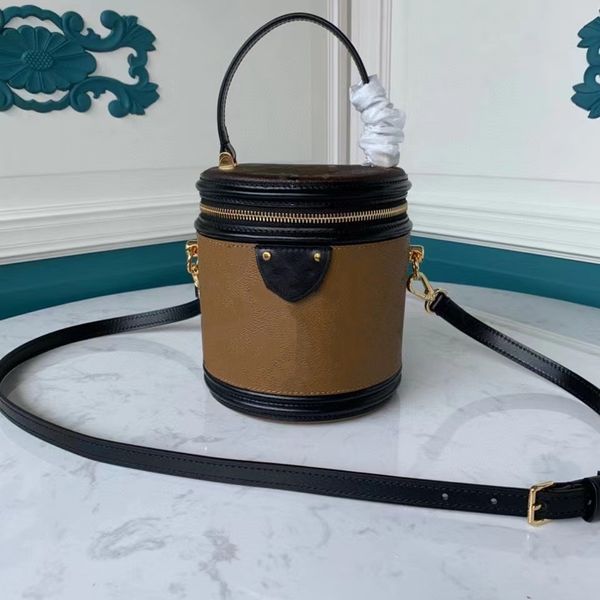 

woman classic cosmetic bag cannes handbag by nicolas ghesquiÃ¨re reverse coated canvas exterior m43986 removable adjustable strap
