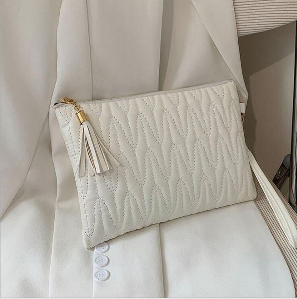 

messenger bag pu shiny tassel pure color temperament simple hand holding fashion handbag