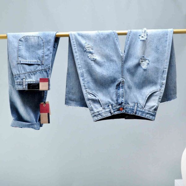 

2021 summer women's thin soup  family hole flanging jeans loose quarter light leg pants, Blue