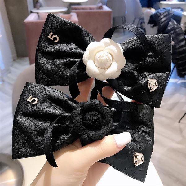 

korea dongdaemun women fashion hair accessories small fragrance leather big bow clip spring camellia hairpin1