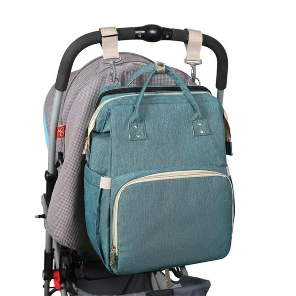 

diaper bags multifunctional mummy bag baby bed moms and dads backpack convertible lightweight stroller