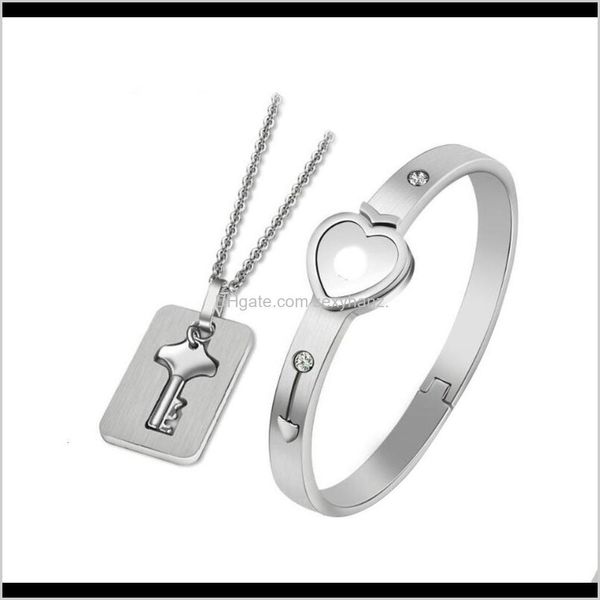 

charm bracelets drop delivery 2021 straight jewelry creative couple interlocking love soars to the sky concentric lock key bracelet ewveb, Golden;silver