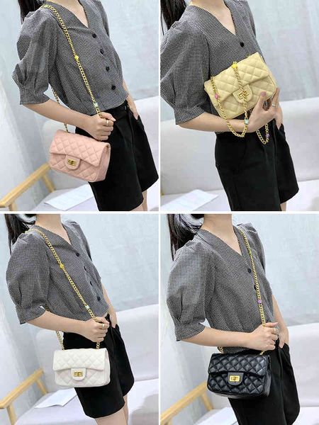 

factory outlet luxury handbags and storage xiaoxiangfeng sheepskin c home 2021 summer fashion new messenger square golden ball lingge c