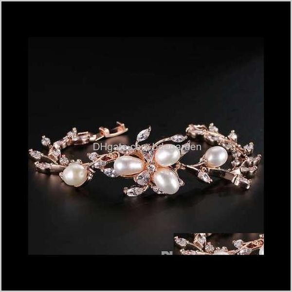

charm drop delivery 2021 uilz trendy rose gold color wedding with cz zirconia cluster flower imitation pearl women bracelets jewelry ub020 a, Golden;silver
