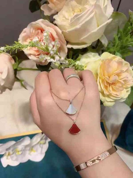 

the new baojia small skirt necklace red white fritillaria s925 silver fan clavicle