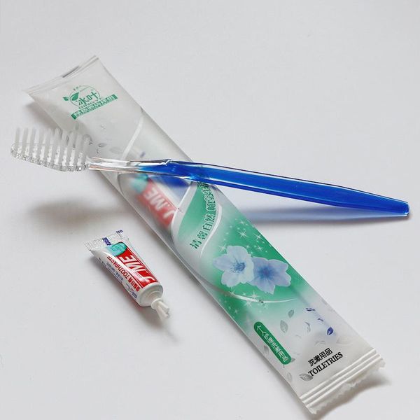 

toothbrush 100pcs/set el disposable with toothpaste kit convenient two in one toiletries travel teeth clean tools
