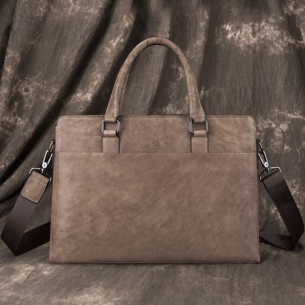

briefcase leather handbag men's bag hand holding fashion simple leisure business