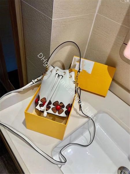 

2021 ss lady fashion handbags floral genuine leather classic retro all-match simplicity bucket bag casual cross body