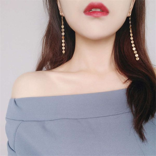 

simple round tassel long earrings female metal sequin