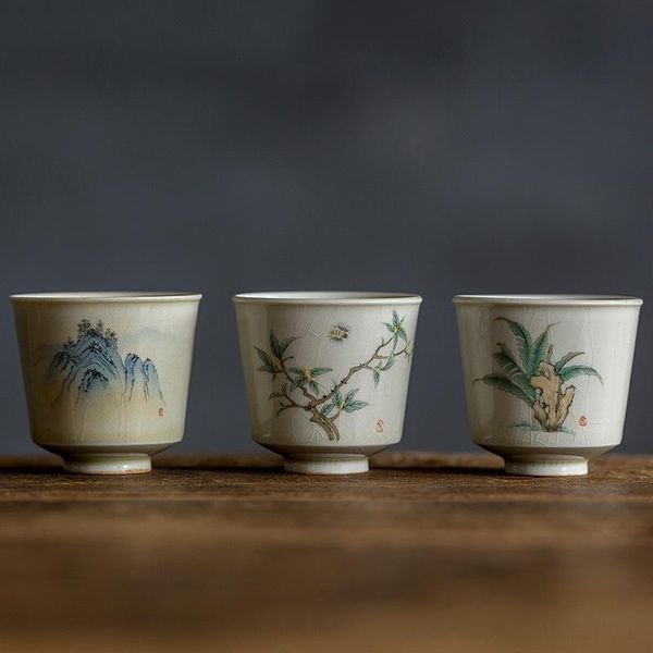 

jingdezhen ancient celadon-glazed hand-painted under-color tea cups can be opened to nourish and sets & saucers