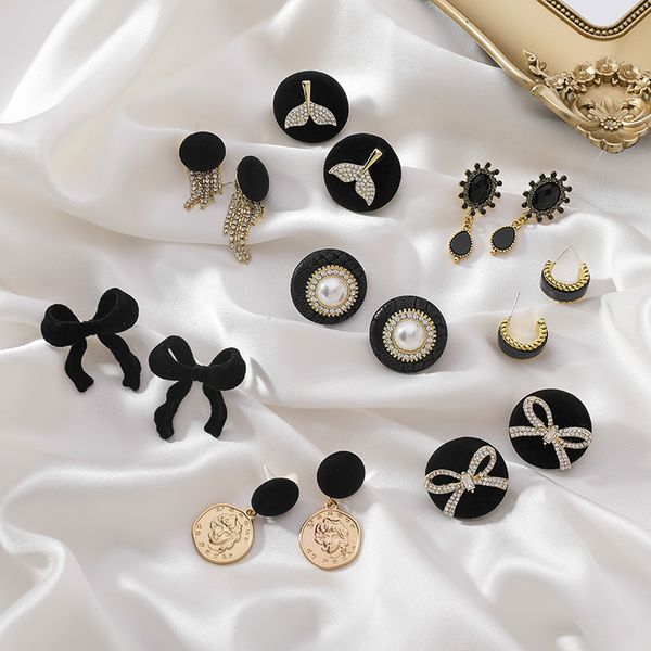 

autumn and winter fashion earrings female s925 silver needle bow fishtail black