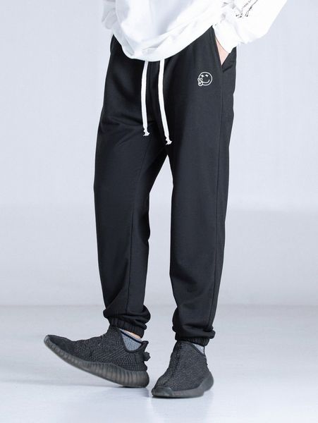 

men drawstring waist cartoon face print sweatpants w790#, Black