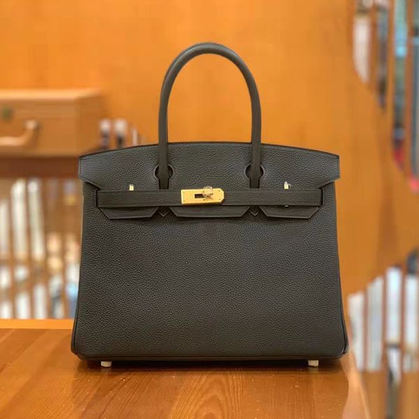 

Handmade portable female platinum togo bag lychee calf black