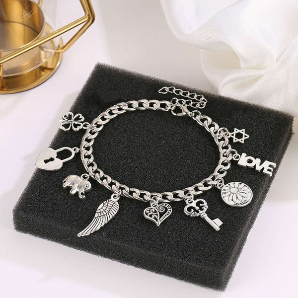 

hand catenary selling bracelet fashion love elephant wing key multi element alloy bracelet, Black