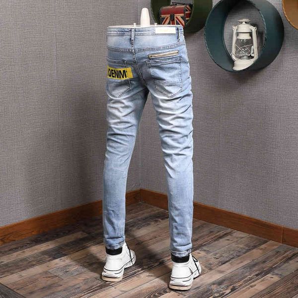 

jeans korean style fashion retro light blue elastic cotton ripped jeans men streetwear printed designer hip hop pencil pants
