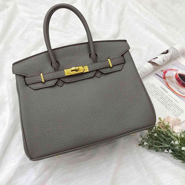 

luxury handbags litchi pattern star new style bag for women