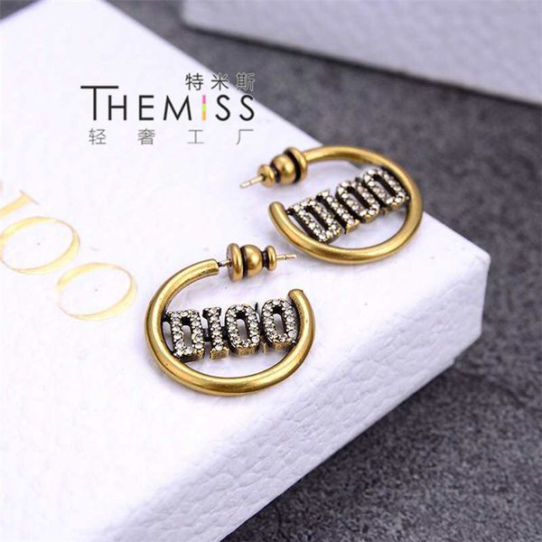 

70% off outlet online full letter earrings 2021 wind needle diamond, Golden