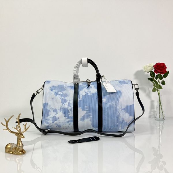 

women luxurys designers bags 2021 keepall bandouliÃ¨re 50 travel bag male and female luggage model: m57946 size 50x29x23cm