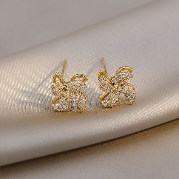 

Korean New Trendy Can Rotatable Windmill Shape Inlaid Dazzling Zircon Ear Studs Charm Lady Earrings Jewelry Unusual Gifts For Women