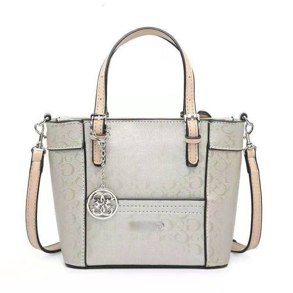 

2021 new guss bright leather old flower portable pendant shopping women's one shoulder diagonal straddle tote bag
