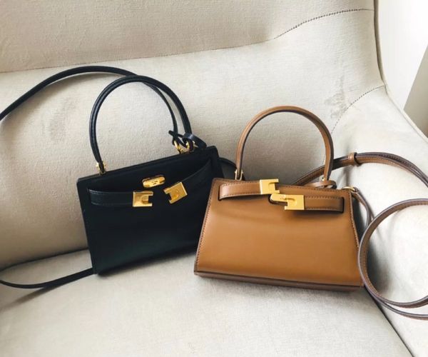 

family's new handbag layer calf leather slung women's bag mini purse outlet