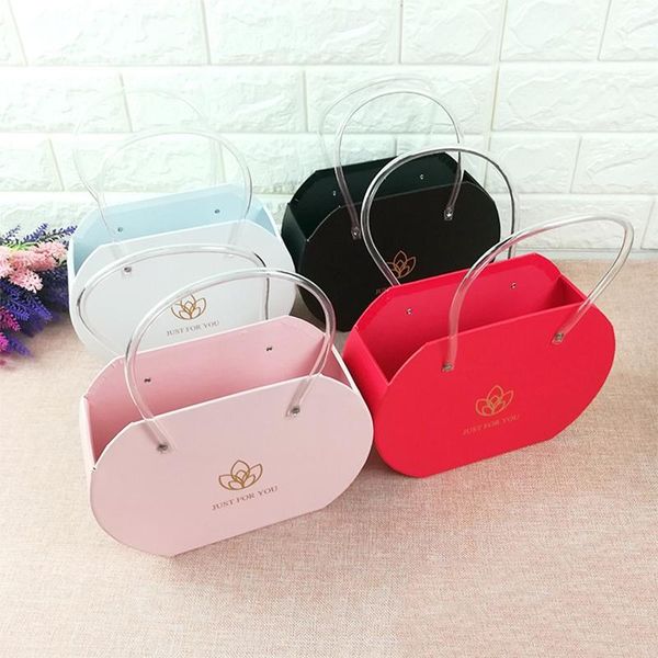 

gift wrap opening bag style paper box with transparent plastic handles holding flowers & gifts just for you happy valentine's day