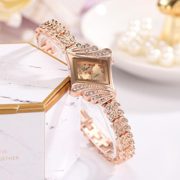 

wristwatches gold crystal rhinestone leaf buds strap dress ladies watch stylish women watches hours quartz bracelet, Slivery;brown